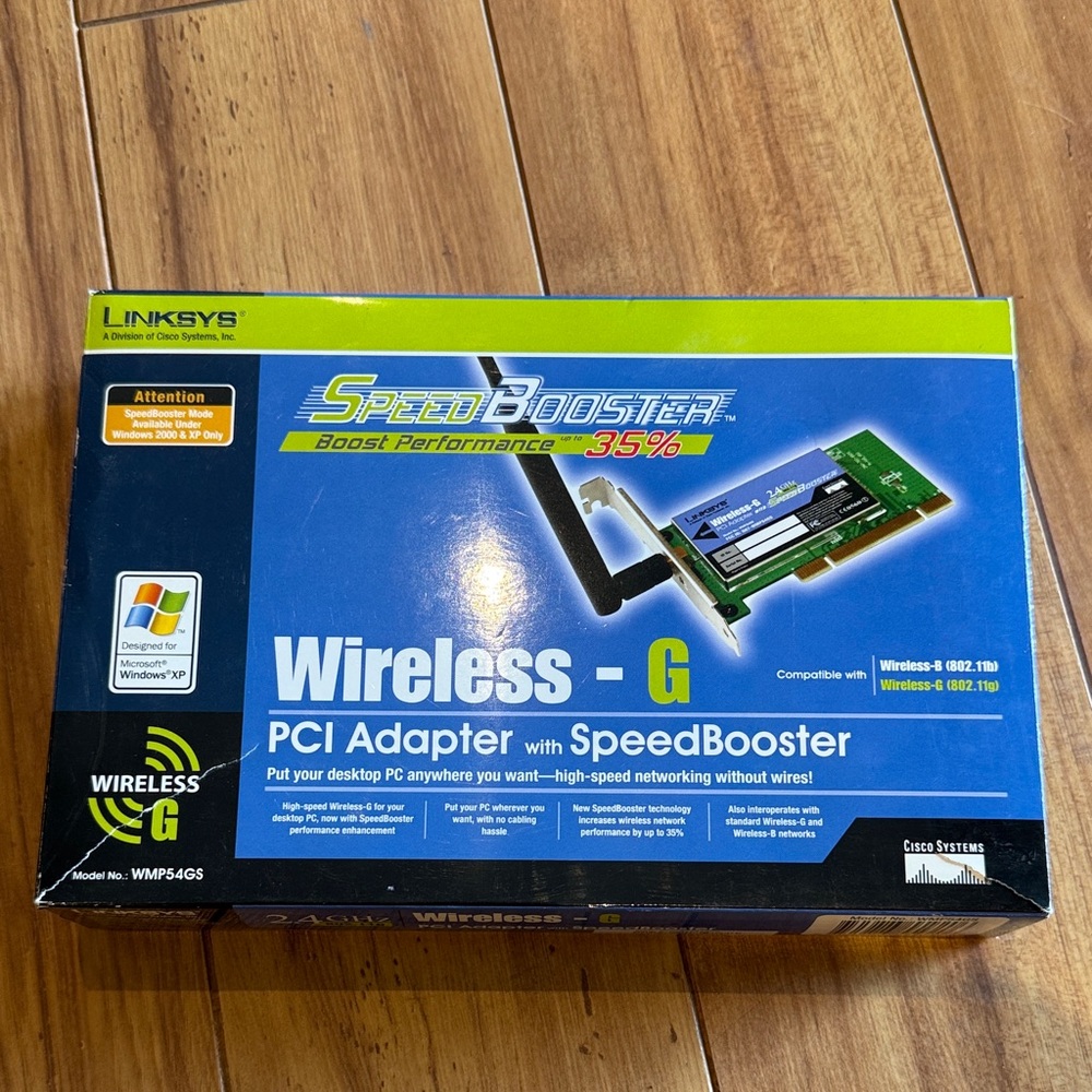 Linksys Wireless-G PCI Adapter with SpeedBooster - Blue and Yellow